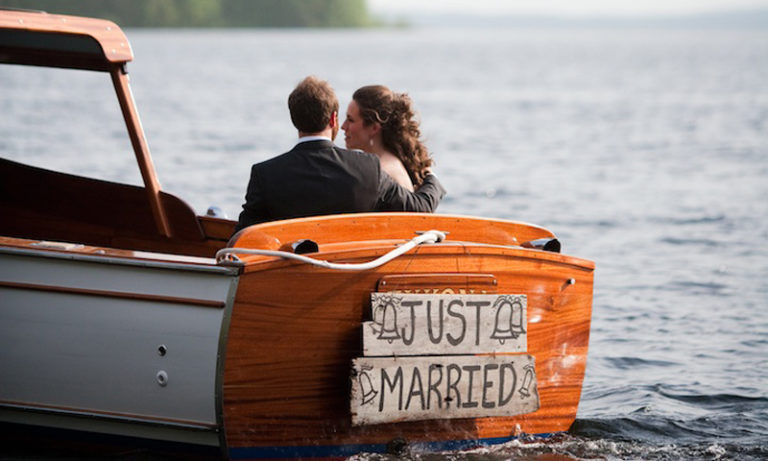 Wedding Couple on Just Married Boat. Photo Provided by Migis Lodge on Sebago Lake Wedding Couple on Just Married Boat. Photo Provided by Migis Lodge on Sebago Lake