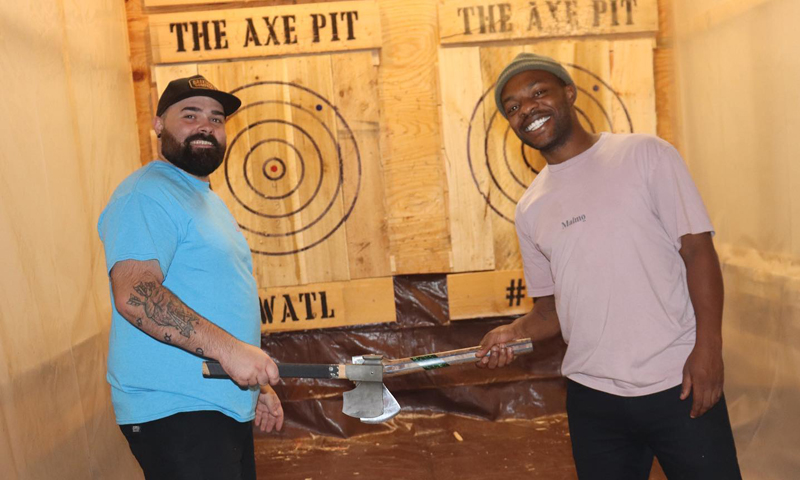 Axe Throwing. Photo Credit: The Axe Pit Axe Throwing. Photo Credit: The Axe Pit