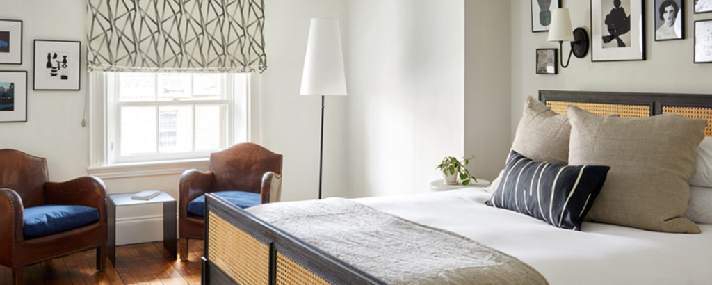 King Bedroom with Wall Art and Chairs, Photo Courtesy of Read McKendree and Lark Hotels King Bedroom with Wall Art and Chairs, Photo Courtesy of Read McKendree and Lark Hotels