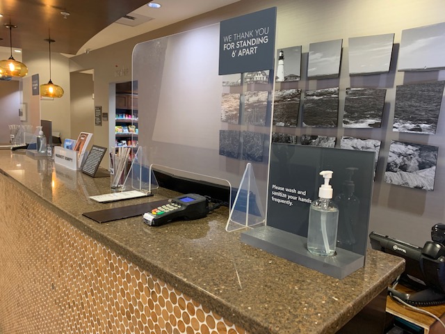 Front desk with protective barrier and sanitizer, Photo Credit: Residence Inn Portland Downtown Waterfront Front desk with protective barrier and sanitizer, Photo Credit: Residence Inn Portland Downtown Waterfront