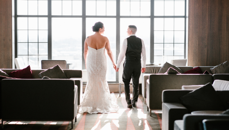 Couple Looking out Window at Wedding, Photo Credit: Jessie Felix Photography via The Westin Couple Looking out Window at Wedding, Photo Credit: Jessie Felix Photography via The Westin