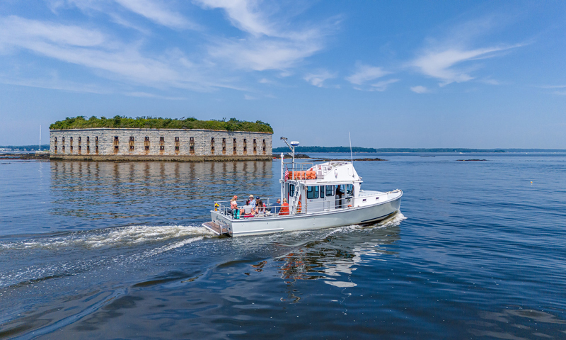 Boat Cruising Past Fort Gorges. Photo Credit: PGM Photography Boat Cruising Past Fort Gorges. Photo Credit: PGM Photography