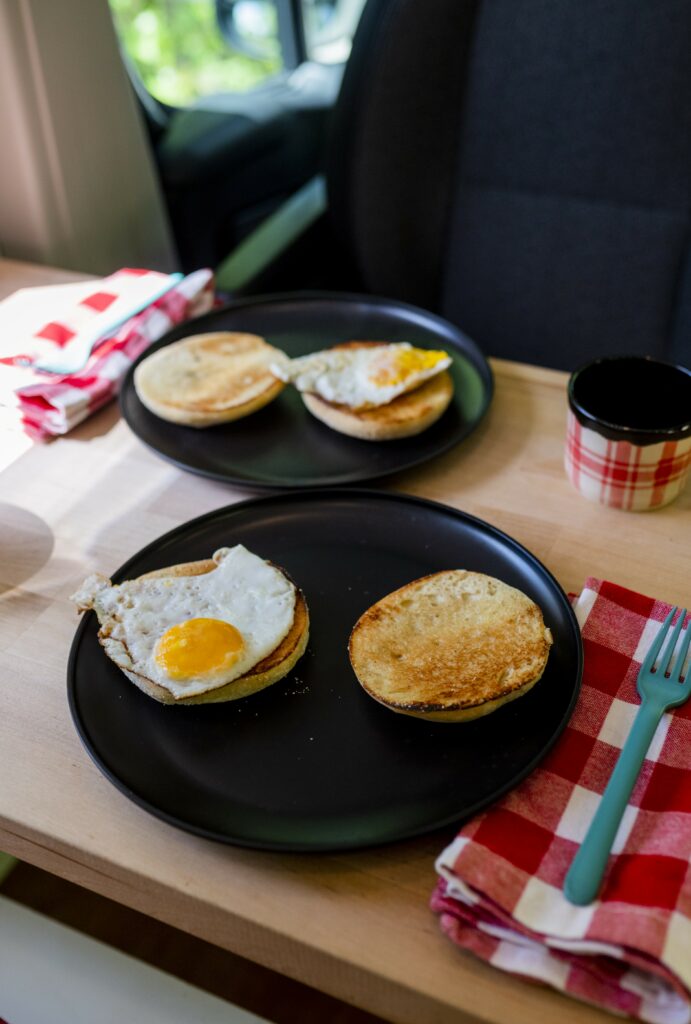 Breakfast at lake in camper van, Photo Credit: Capshore Photography Breakfast at lake in camper van, Photo Credit: Capshore Photography