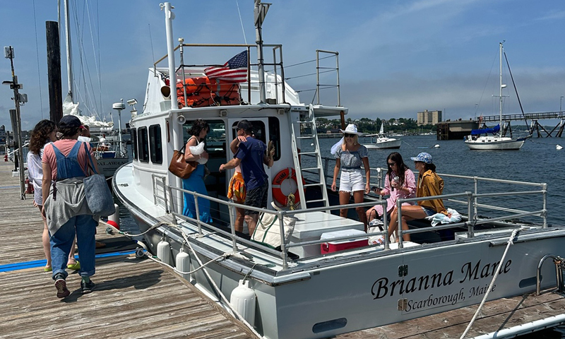Group Getting on Boat. Photo Credit: Owen Johnson Group Getting on Boat. Photo Credit: Owen Johnson
