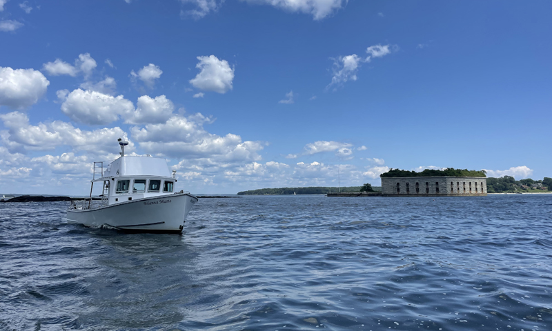 Boat Cruising over Casco Bay. Photo Credit: Owen Johnson Boat Cruising over Casco Bay. Photo Credit: Owen Johnson