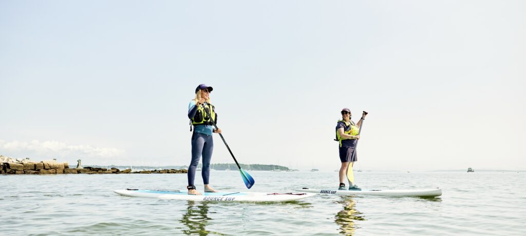 Paddle board duo. Photo credit: Lone Spruce Creative, courtesy of Maine Office of Tourism Paddle board duo. Photo credit: Lone Spruce Creative, courtesy of Maine Office of Tourism