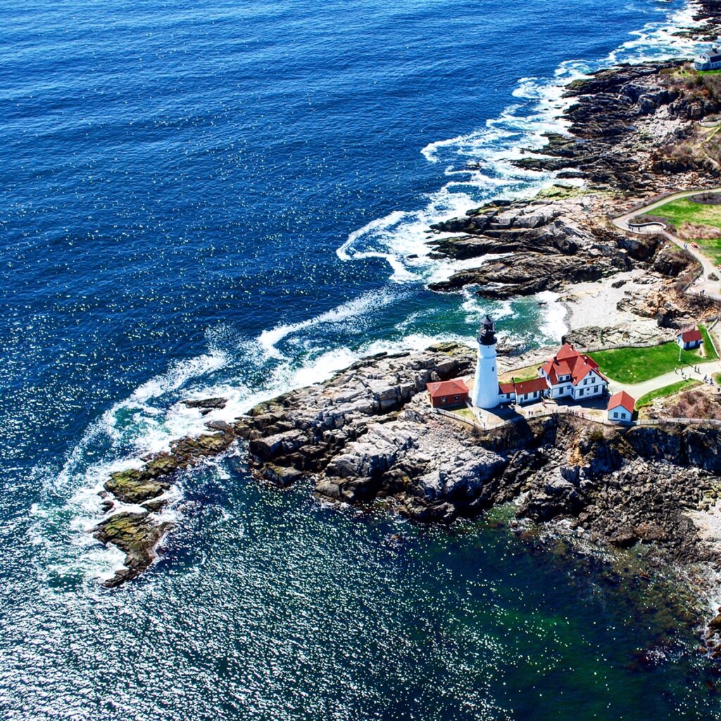 View of Portland Head Light from Helicopter. Photo Credit: Pine Tree Helicopters View of Portland Head Light from Helicopter. Photo Credit: Pine Tree Helicopters