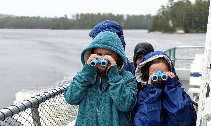 Kids enjoying binoculars on rainy day: Photo Credit: Maine Maritime Museum Kids enjoying binoculars on rainy day: Photo Credit: Maine Maritime Museum